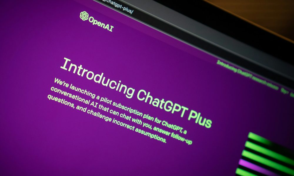 a close up of a computer screen with a purple background
